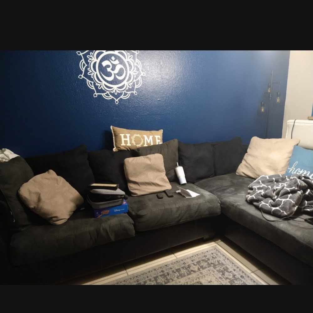 L Shaped Couch with pillows